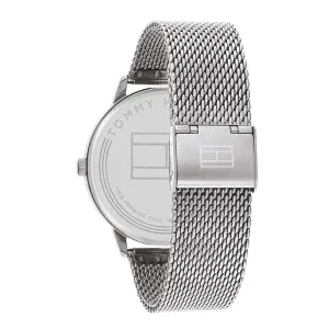 A sleek silver Tommy Hilfiger watch featuring a mesh strap and polished case, showcasing the brand logo on the back.